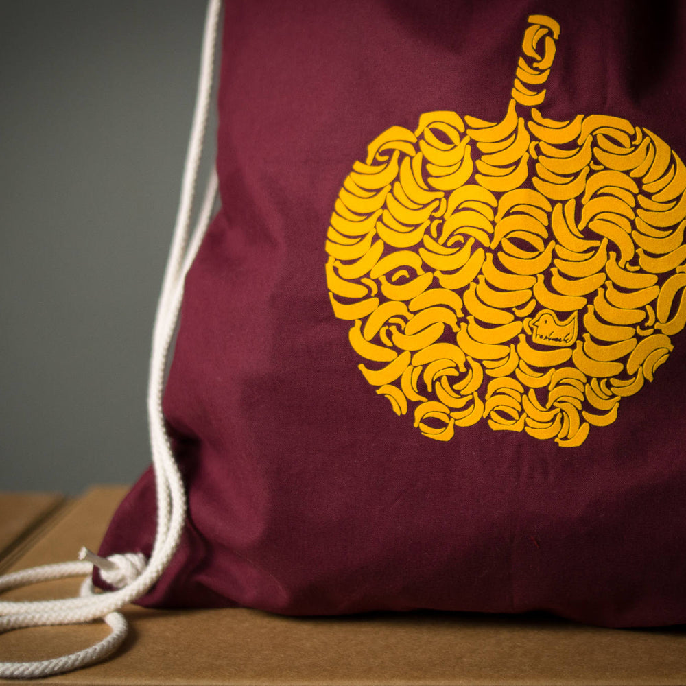 
                  
                    Apfel Turnbeutel - Rucksack mit Apfel aus Bananen in Gelb mit Aufdruck gymsac Farbe Rot / Bordeaux -  Flock Motiv zum nachdenken Festival
                  
                