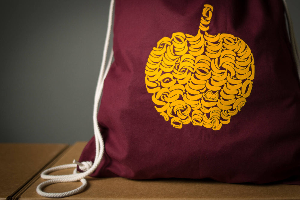 Apfel Turnbeutel - Rucksack mit Apfel aus Bananen in Gelb mit Aufdruck gymsac Farbe Rot / Bordeaux -  Flock Motiv zum nachdenken Festival