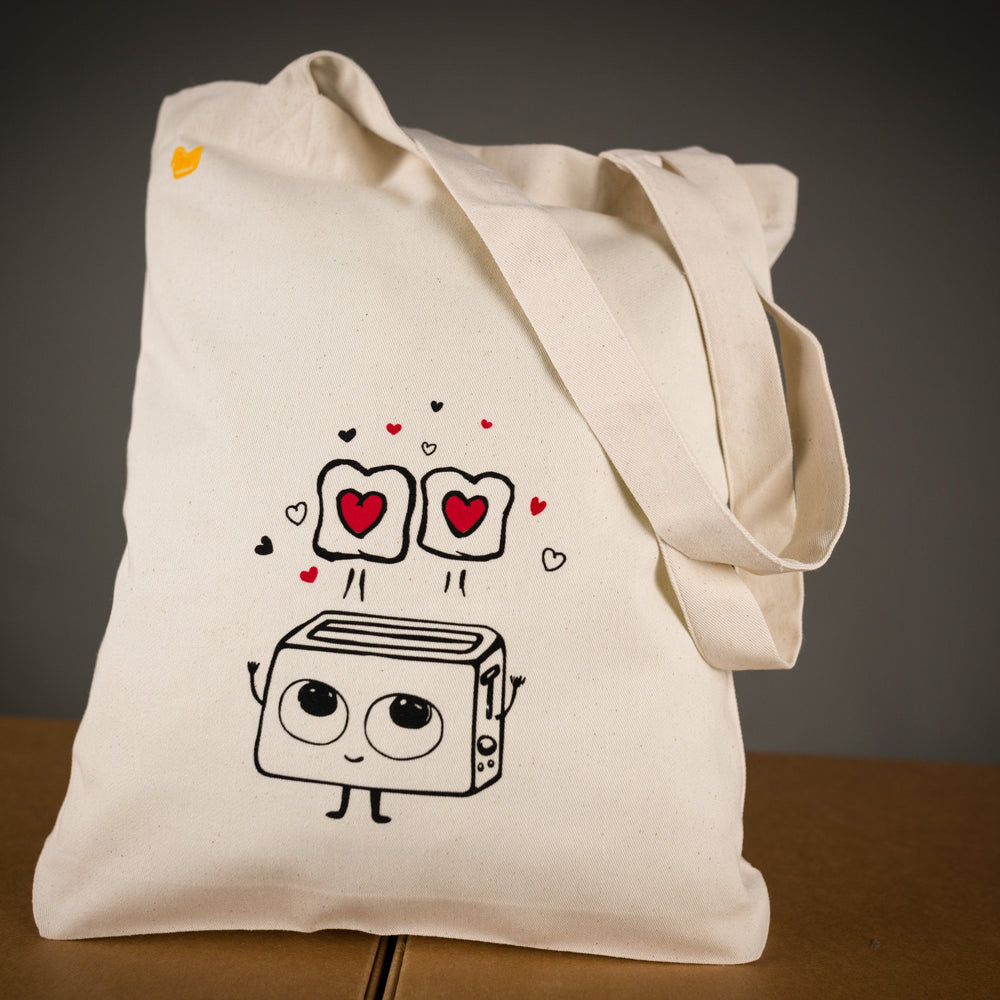 
                  
                    Schöner Jutebeutel mit Toaster Aufdruck - lustige Bio Einkaufstasche, süsser Toaster mit Herzen Motiv , recycelte Baumwolltasche Geschenk
                  
                