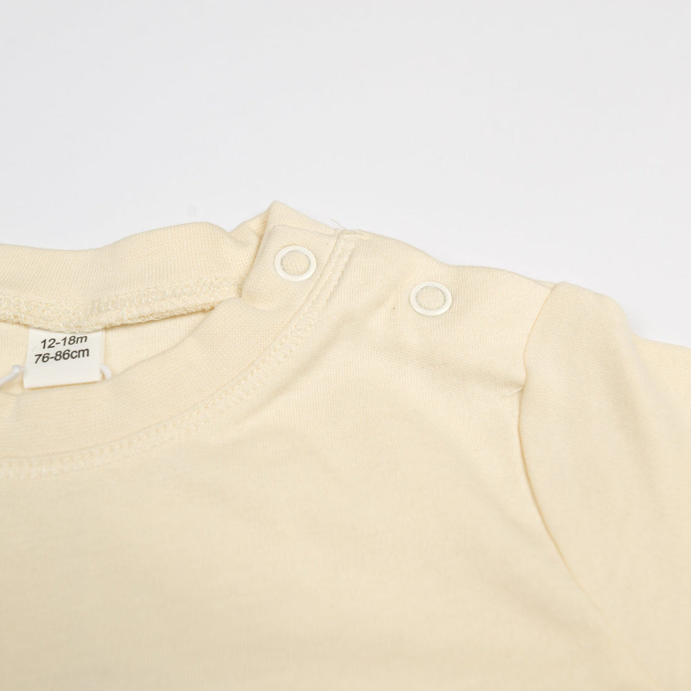 
                  
                    Baby T-Shirt aus Bio Baumwolle mit niedlichem Knoblauch Aufdruck
                  
                