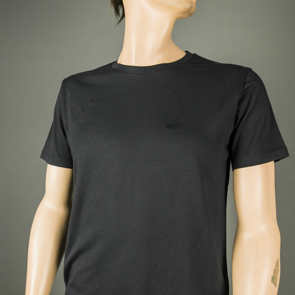 
                  
                    Weisses T-Shirt für Männer aus Biobaumwolle mit minimalistischem Brustlogo aus Flock schwarz
                  
                