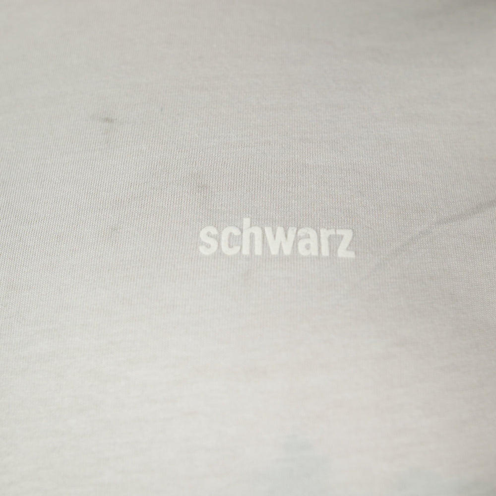 
                  
                    Schwarzes T-Shirt für Männer aus Biobaumwolle mit minimalistischem Brustlogo aus Flock in weiss motto shirt
                  
                