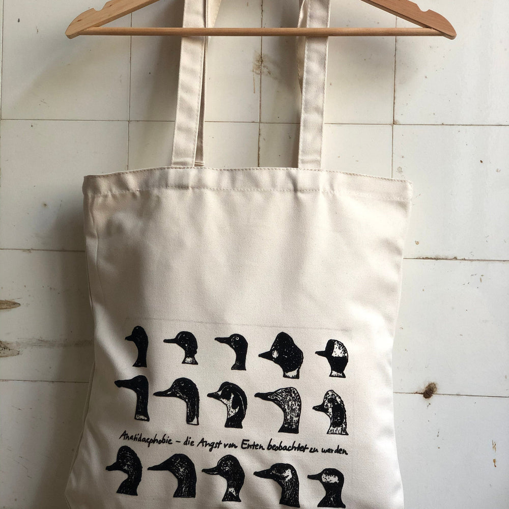 
                  
                    Stabile Einkaufstasche in beige mit Entenphobie Motiv super fürs Shopping - schicke Tasche mit Enten für den Frühling Bio Jutebeutel Beutel
                  
                