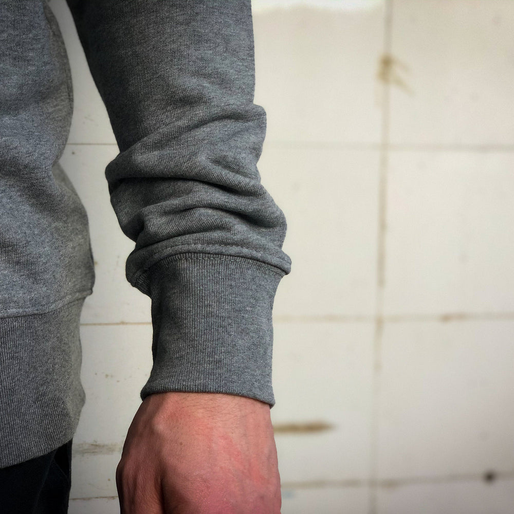 
                  
                    Dagegen Sweatshirt für Männer in grau aus Biobaumwolle mit lustigem Brustlogo aus Flock
                  
                
