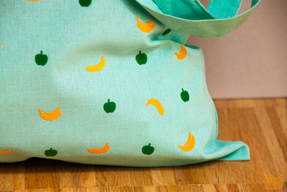 Fruchtige Strandtasche in Mint mit flauschig gelben Bananen und grünen Äpfeln super fürs Shopping - Einkaufstasche Jutebeutel